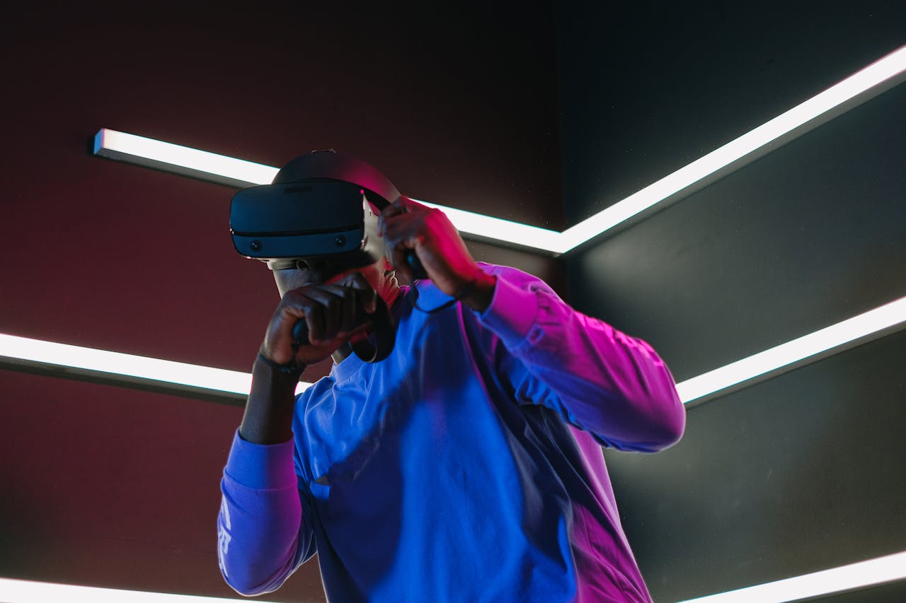An adult man fully engaged in a virtual reality simulation with VR headset in a futuristic setting.